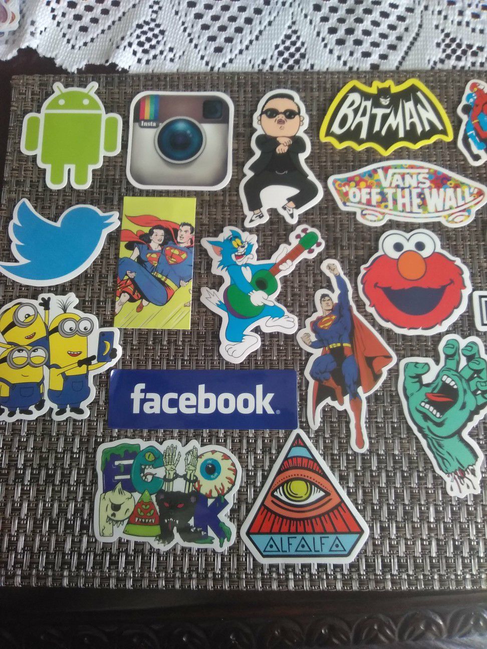 Stickers, skateboard, laptop, refrigerator