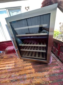 Stainless Steel Wine Cooler with Wood Shelves Avanti 43-bottle dual-zone