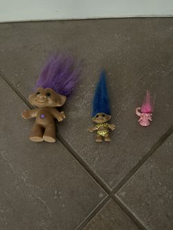ALL 3 TROLLS - ONE IS 3 INCHES, ONE IS 1 1/2 INCHES(BOTH NOT INCLUDING THE HAIR), AND A RING FOR ONLY $6.00