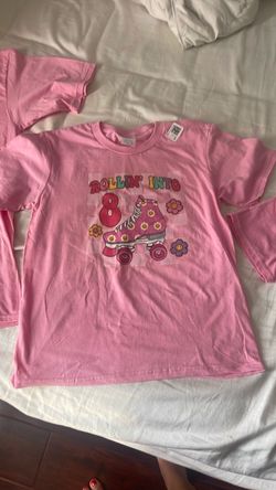 Rolling into 8 shirts pink girls