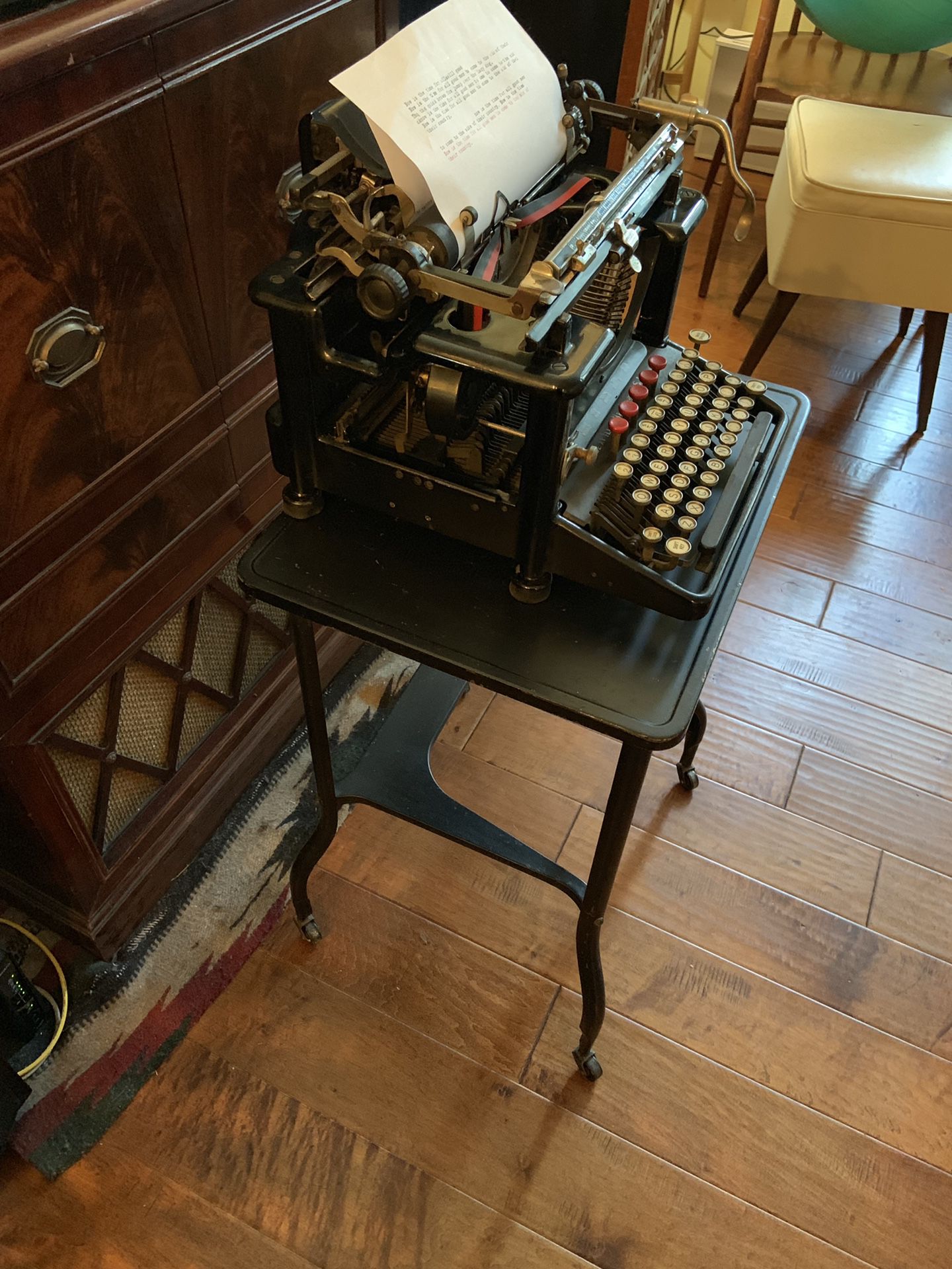 Remington antique typewriter and typewriter stand