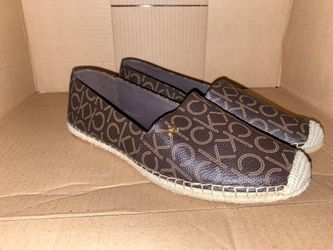 Calvin Klein flats/ slip ons