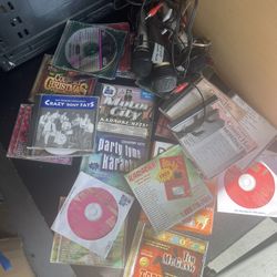 Over 20 Karaoke CDs And Some Mics