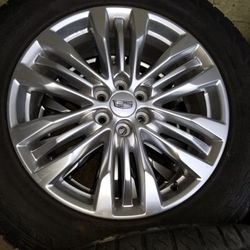 Cadillac set of 4 wheels.