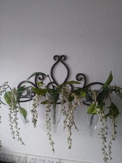 Wrought iron and crystal wall decorations