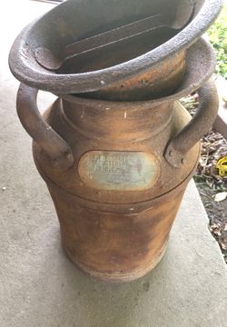 Vintage milk jug says A.M. Roberts Glouster , O. T. & O.C. Blue valley crlameryco