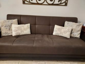 Brown well care futon with bottom storage