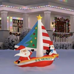 7.5 ft. Santa and Penguin in Sailboat Inflatable