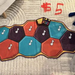 B. toys Mat-A-Matics Musical Mat
