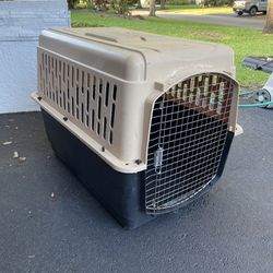 Large dog crate. About 26”x39”x29” high. Coral Springs near University and Wiles.  $30