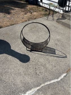 25” toll steel firewood storage rack for $10.00