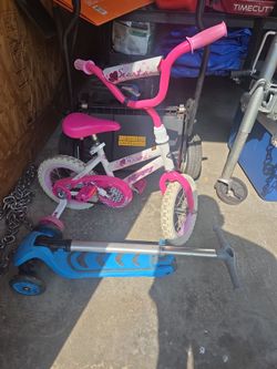 Little girls bike and scooter