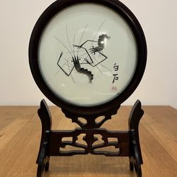 Asian decoration on pivotal stand