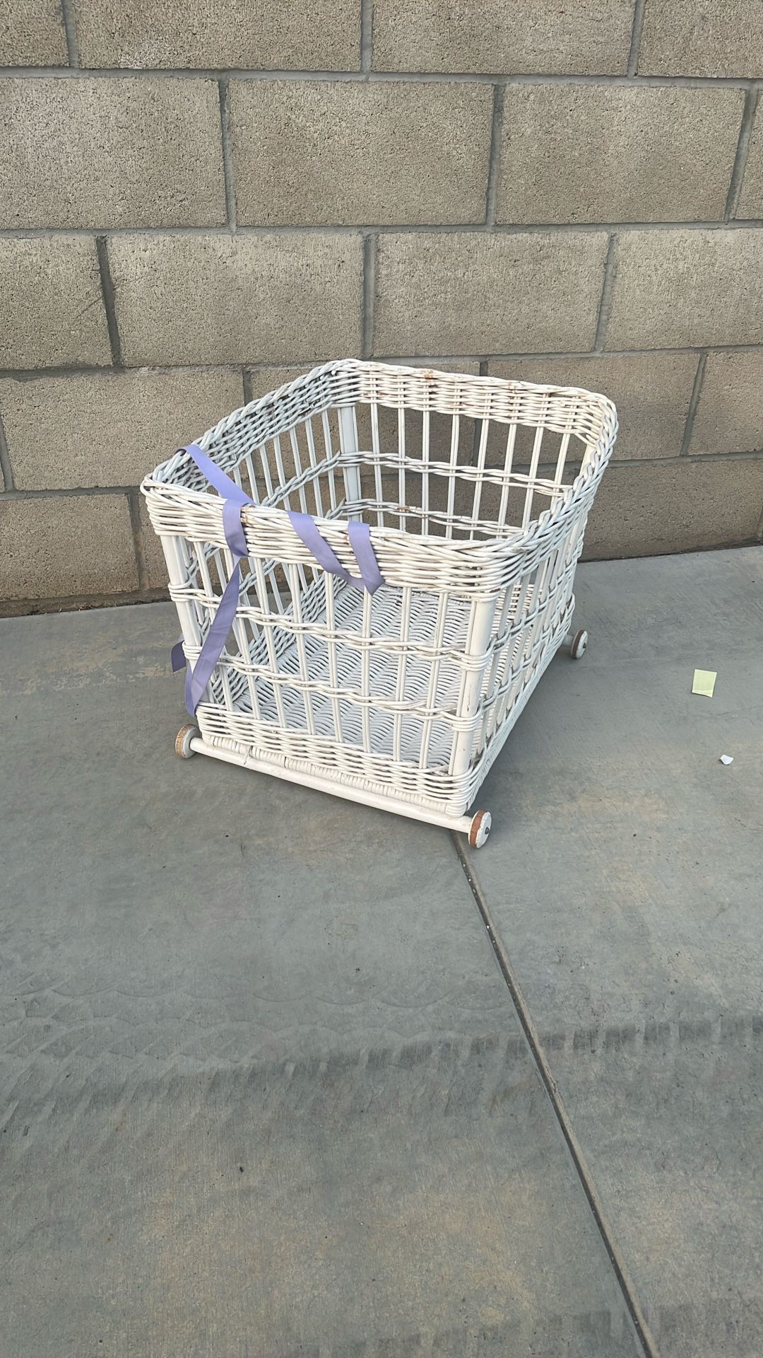 White wicker, rolling basket
