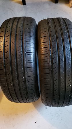 Land sport in good condition 2 tires 215 55 17 80% tread