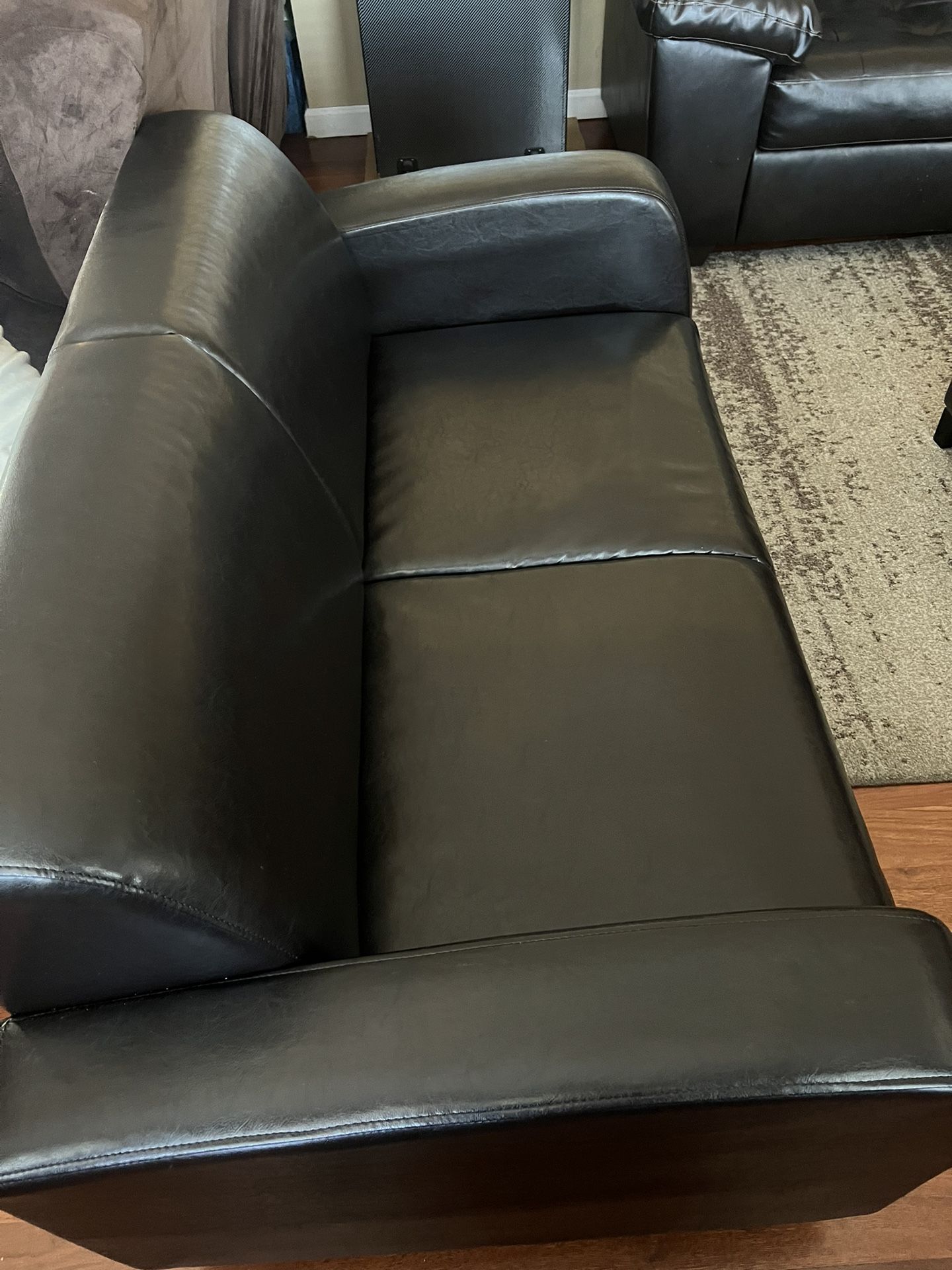 Brown Leather Two Seat Couch