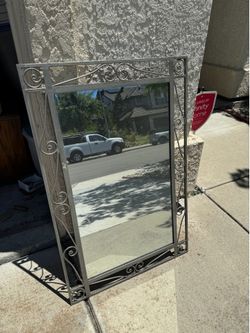 Metal frame mirror