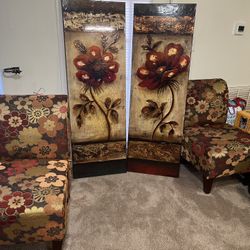 Two Chairs And Two Pictures