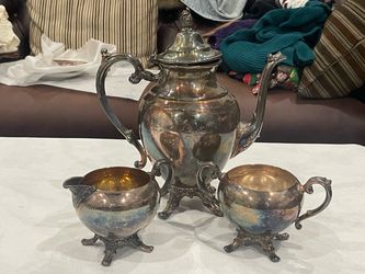 3 piece silver-plated coffee or tea service with scrolled feet. Early to mid 20th Century