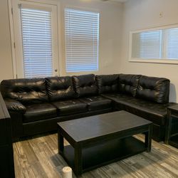 Black Leather Two Piece Sectional Couch