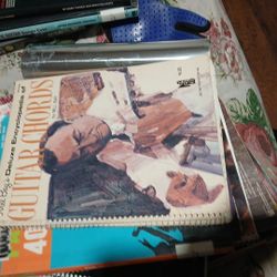 Mel Bays Deluxe encyclopedia of guitar chords by bill Bay.