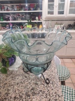 vintage, hand-blown art glass center bowl with a scalloped, ruffled edge and a blue-green hue