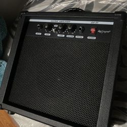 Electric Bass Guitar / Amplifier 