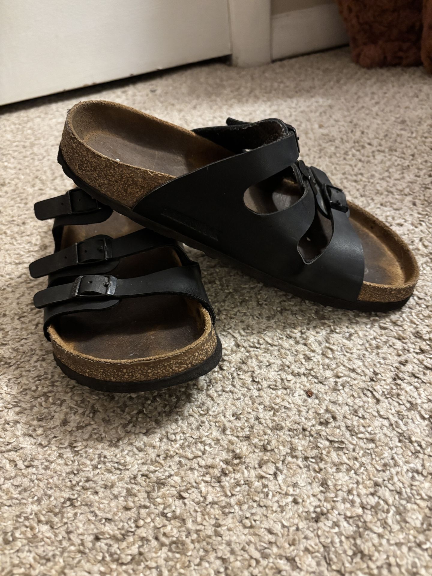 Black size 8 women’s Birkenstocks.