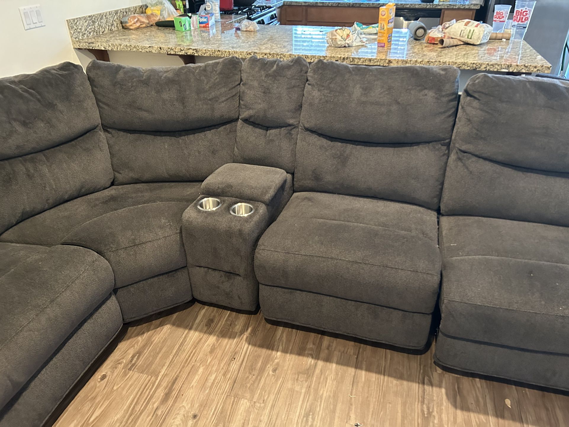 Mildly Used Dark Grey Sectional Couch. 