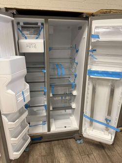 Whirlpool stainless steel side by side fridge new with warranty