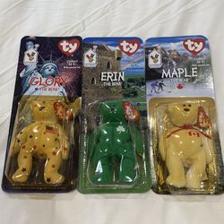 Collectible  Ty McDonald's Teenie Beanie Babies from the International Bears set, including Glory the Bear, Erin the Bear, and Maple the Bear.
