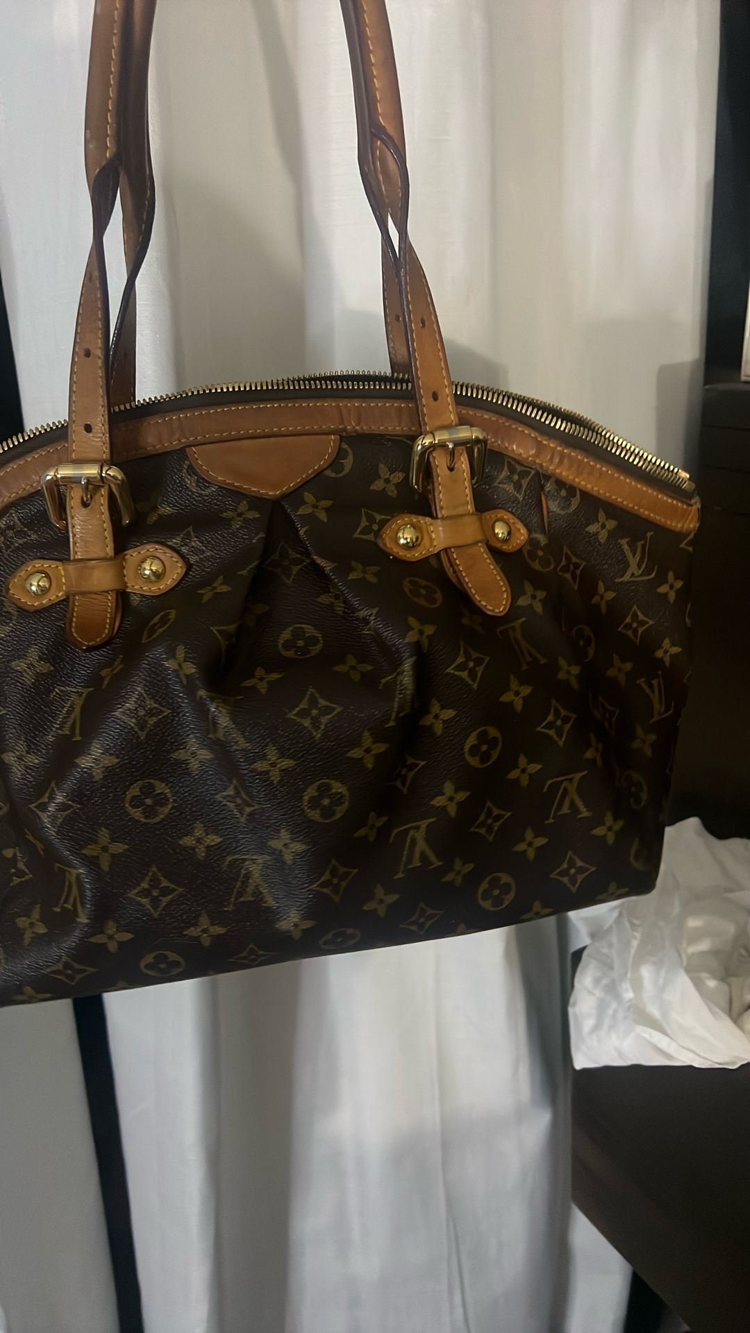 Louis Vuitton Tivoli GM bag.