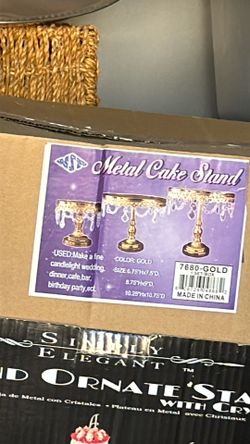 Two sets gold/ glass cake stands take both$50
