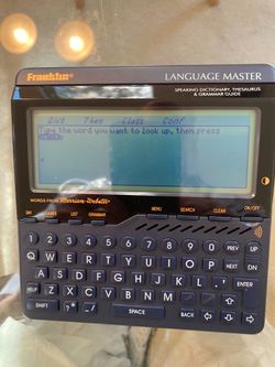 Franklin Language Master: Speaking Dictionary, thesaurus and Grammar Guide  with zipper case. Battery