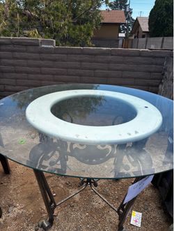 Glass table with metal base