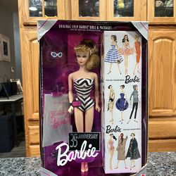 1959 Barbie Doll 35th Anniversary never opened Box. Special edition reproduction.  The box has some damage due to storage on the corners and bottom.  