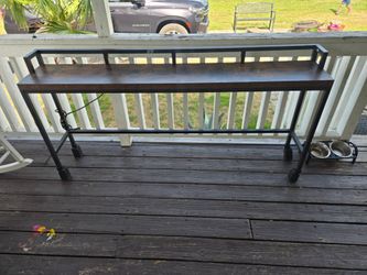 Wall table with outlet