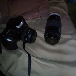 Minolta Camera And Zoom Lens 