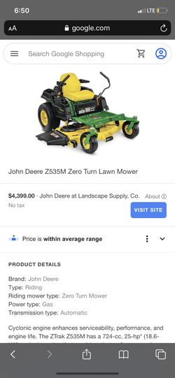 John Deere mowing grass