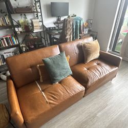 Tan Pleather sofa. 