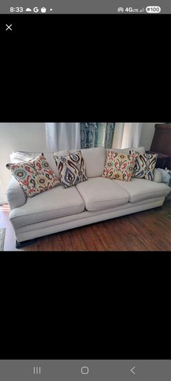 Beige sofa with cushions