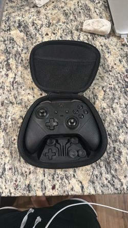 Two Xbox controllers
