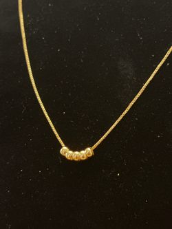 Women gold necklace