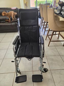 Reclining wheelchair and commode