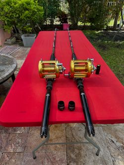 Pair of 2-Speed Penn International II 50SW’s Combined with Outer Banks IGFA 50 Trolling Rods - All in Very Good Condition