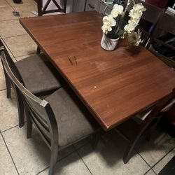 22  Inch Rims And Low ProfileTires No Leaks-$500, Dinning Table And 6 Chairs-150, Battery Charger And Jumper-100