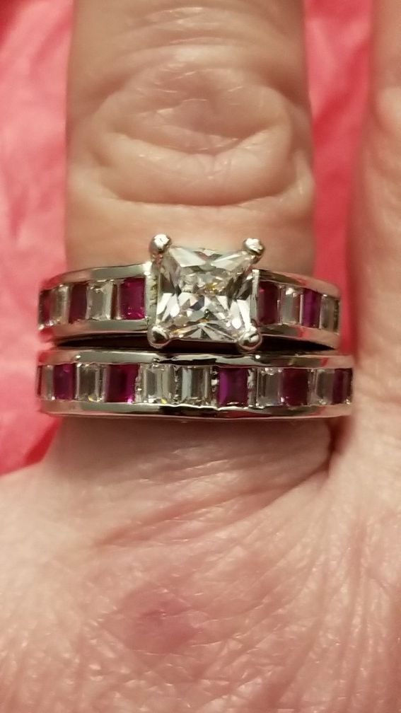 New 925 silver stamped white Cz apnd ruby wedding set. Size 8.