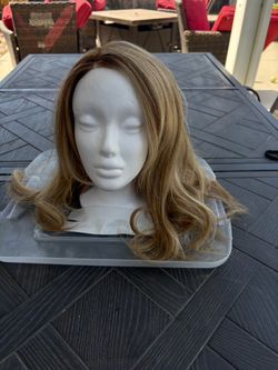 Hundred percent human hair blonde wig