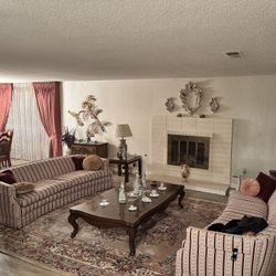 Set Of 2 French Louis XVI style sofas, characterized by its refined, formal silhouette and traditional striped damask upholstery.