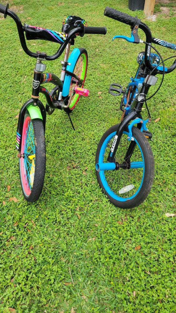 Girl And Boys Bike